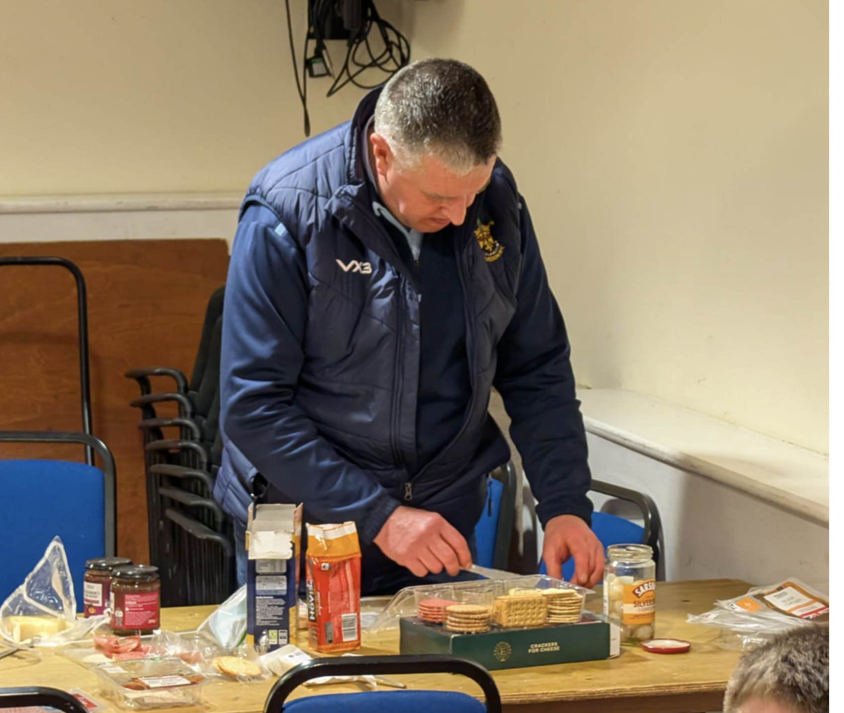 Saxons Manager John MaGuigan - Tucking into the Cheese & Biscuits